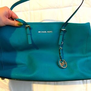 Michael Kor’s turquoise purse